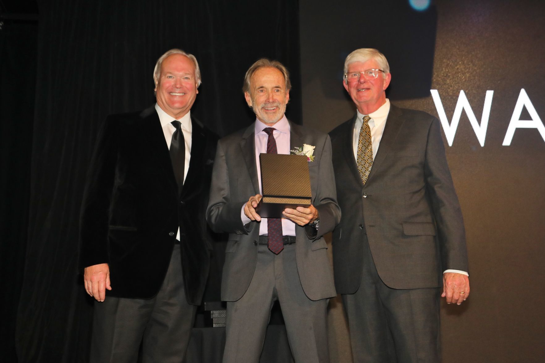 Dick Miles, Chairman of the Board, Walter Iooss, honoree, Bob Bishop, chair of induction committee and board member